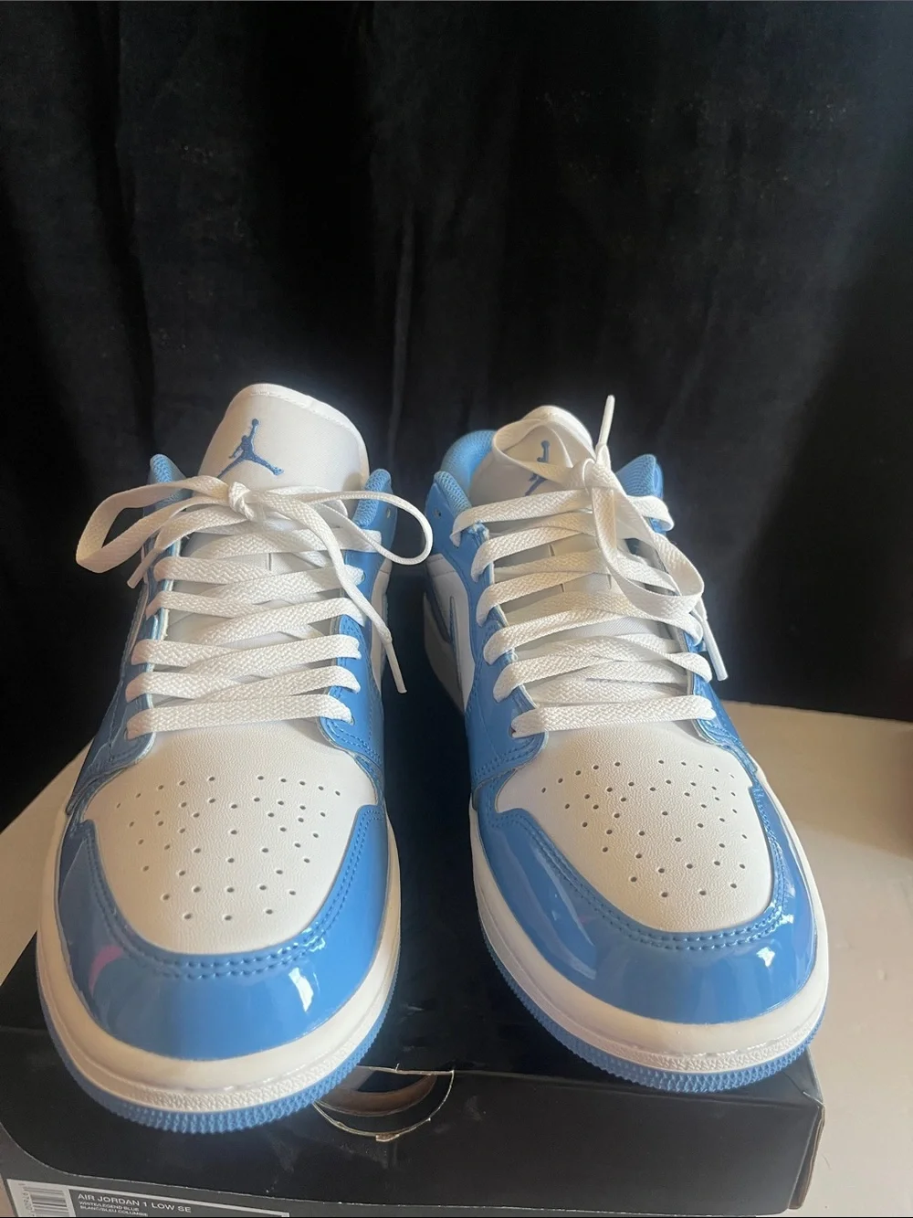 Air Jordan 1 Low SE Sneakers in White and Light Blue